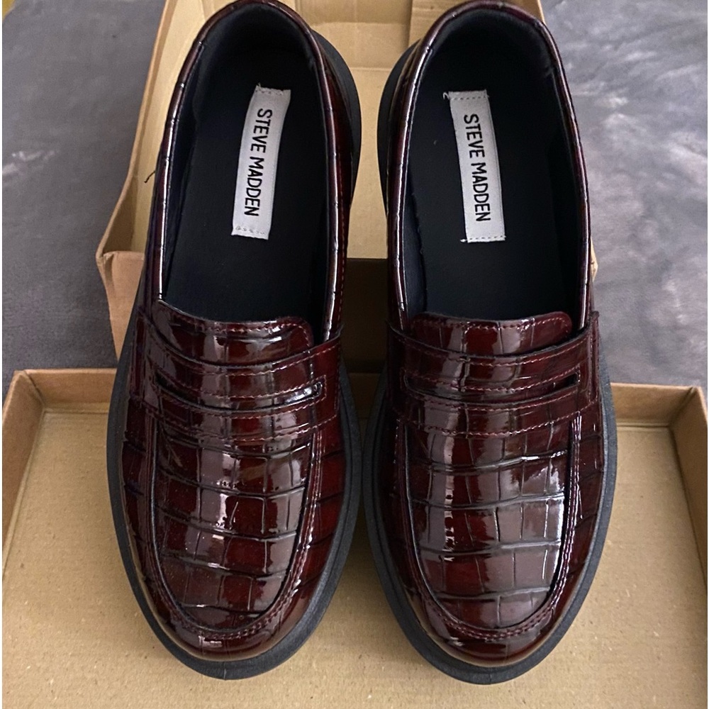 Burgundy platform loafers by Steve Madden.
